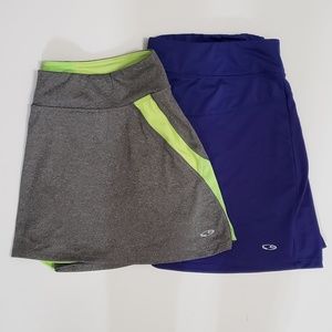Two Champion tennis skirts.
